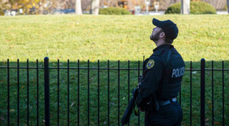 A uniformed Secret Service Officer patrols the White House grounds during a lockdown due to an airspace violation, Tuesday, Nov. 26, 2019, in Washington. (AP Photo/ Evan Vucci) A uniformed Secret Service Officer patrols the White House grounds during a lockdown due to an airspace violation, Tuesday, Nov. 26, 2019, in Washington. (AP Photo/ Evan Vucci)