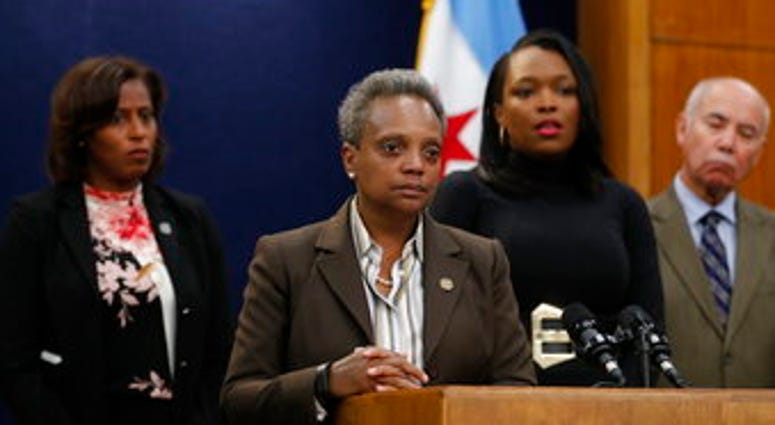Mayor Lori Lightfoot speaks during a news conference at Chicago City Hall. Lightfoot said classes would be canceled Thursday after determining that she can't accept the Chicago Teachers Union's demands. (Jose M. Osorio/Chicago Tribune via AP)
