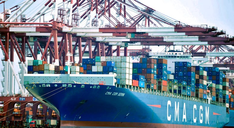 FILE - In this July 6, 2018, file photo, a container ship is docked at a port in Qingdao, in eastern China's Shandong Province. The Trump administration is proposing raising planned taxes on $200 billion in Chinese imports to 25 percent from 10 percent, t