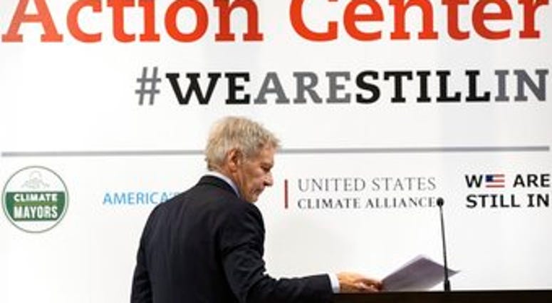 US actor Harrison Ford walks at the stage of the US Climate action center during the COP25 summit in Madrid, Tuesday Dec. 10, 2019. (AP Photo/Bernat Armangue) US actor Harrison Ford walks at the stage of the US Climate action center during the COP25 summit in Madrid, Tuesday Dec. 10, 2019. (AP Photo/Bernat Armangue)