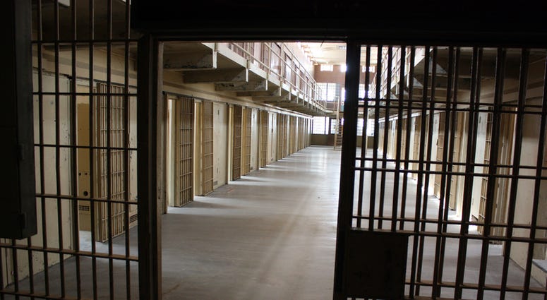 A multi-tiered cellblock is seen from the prison guard secured area. © Conchasdiver - Dreamstime.com A multi-tiered cellblock is seen from the prison guard secured area. © Conchasdiver - Dreamstime.com