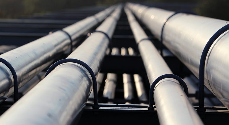Crude oil silver pipeline transportation to refinery. © Kodym | Dreamstime.com Crude oil silver pipeline transportation to refinery. © Kodym | Dreamstime.com