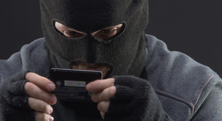 A stolen credit card in hand. (Dreamstine) A stolen credit card in hand. (Dreamstine)