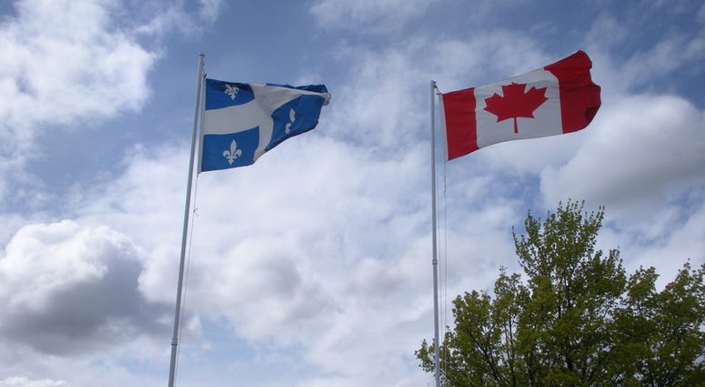 Flags of Canada and Quebec. (Dreamstime)