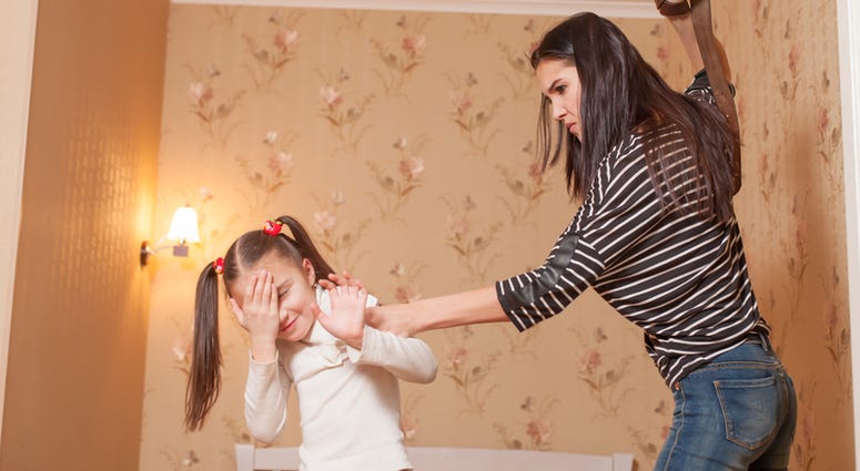Strict mother hit her little daughter with belt. © Nomadsoul1 - Dreamstime.com Strict mother hit her little daughter with belt. © Nomadsoul1 - Dreamstime.com