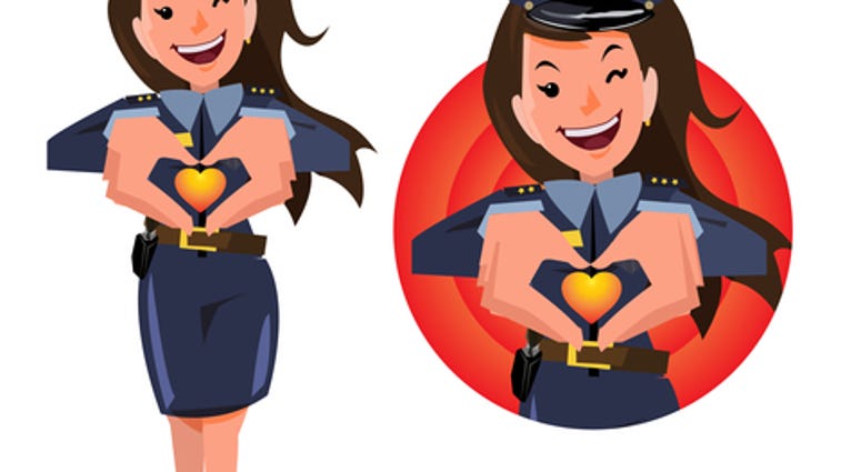 Woman police officer making a heart with her hands. take care people
