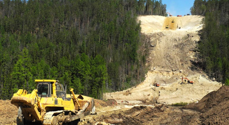 New Oil pipeline under busy construction site