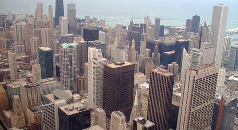 Download comp Downtown Chicago city skyline as seen from the 103rd floor of the Sears tower.