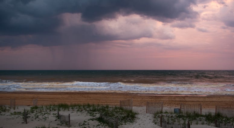 The view of distant hurricane in the Atlantic ocean