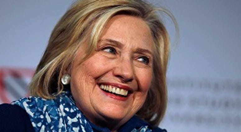 FILE - In this May 25, 2018 file photo, Hillary Clinton smiles as she is introduced at Harvard University in Cambridge, Mass. (AP Photo/Charles Krupa) FILE - In this May 25, 2018 file photo, Hillary Clinton smiles as she is introduced at Harvard University in Cambridge, Mass. (AP Photo/Charles Krupa)