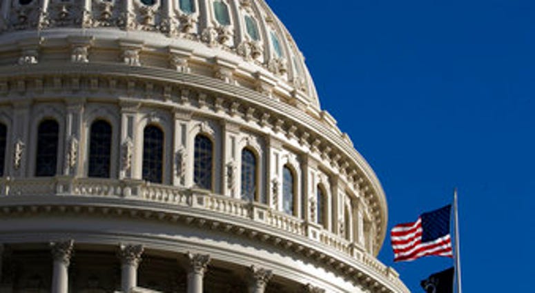 The U.S. flag flies over the U.S. Capitol in Washington, Sunday, Jan. 19, 2020. (AP Photo/Manuel Balce Ceneta) The U.S. flag flies over the U.S. Capitol in Washington, Sunday, Jan. 19, 2020. (AP Photo/Manuel Balce Ceneta)