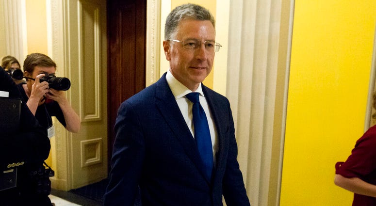 FILE - In this Oct. 3, 2019 file photo, Kurt Volker, a former special envoy to Ukraine, is leaving after a closed-door interview with House investigators, at the Capitol in Washington. (AP Photo/Jose Luis Magana)