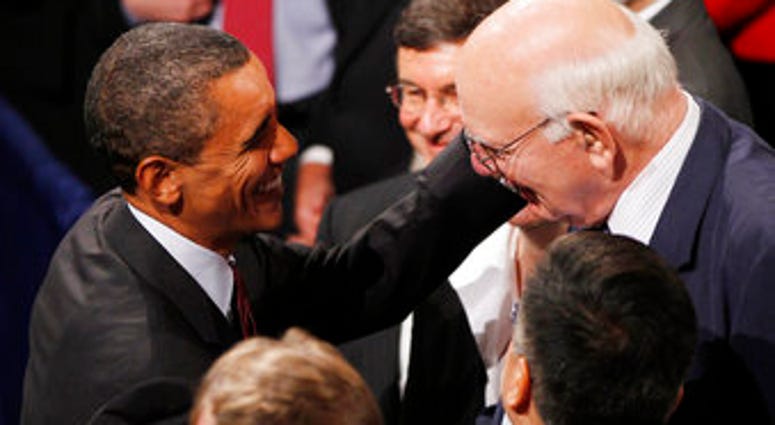 FILE - In this July 21, 2010, file photo President Barack Obama greets Paul Volcker after Obama signed the Dodd-Frank Wall Street Reform and Consumer Protection financial reform bill. (AP Photo/Charles Dharapak, File) FILE - In this July 21, 2010, file photo President Barack Obama greets Paul Volcker after Obama signed the Dodd-Frank Wall Street Reform and Consumer Protection financial reform bill. (AP Photo/Charles Dharapak, File)
