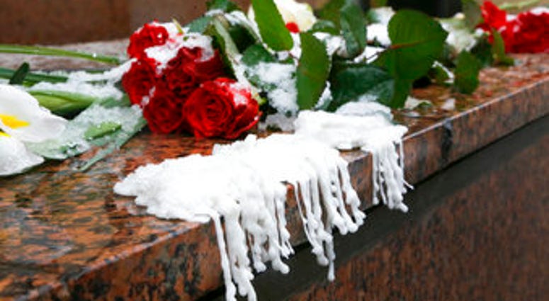 Wax from melted candles next to flowers are placed at the Canadian Embassy during a national day of mourning in Kyiv, Ukraine for the victims of the Ukrainian 737-800 plane that crashed on the outskirts of Tehran. (AP Photo/Efrem Lukatsky) Wax from melted candles next to flowers are placed at the Canadian Embassy during a national day of mourning in Kyiv, Ukraine for the victims of the Ukrainian 737-800 plane that crashed on the outskirts of Tehran. (AP Photo/Efrem Lukatsky)