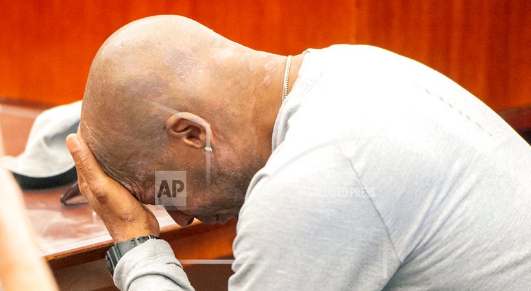 Plaintiff Dewayne Johnson reacts after hearing the verdict in his case against Monsanto at the Superior Court of California in San Francisco on Friday, Aug. 10, 2018. A San Francisco jury on Friday ordered agribusiness giant Monsanto to pay $289 million