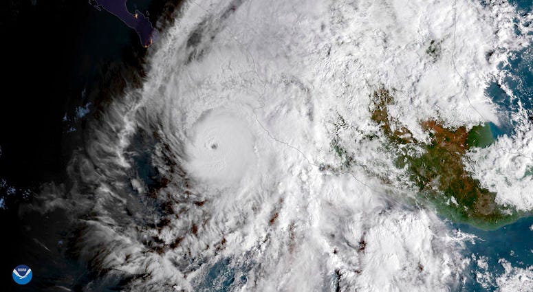 This GOES East satellite image provided by NOAA shows Hurricane Willa in the eastern Pacific, on a path toward Mexico's Pacific coast on Monday, Oct. 22, 2018