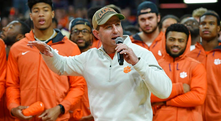 Clemson head football coach Dabo Swinney along with members of the 2019 National Championship football team Jan.12, 2019, in Clemson, S.C