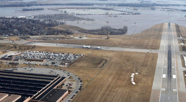 This March 17, 2019 photo released by the U.S. Air Force shows an aerial view of Offutt Air Force Base and the surrounding areas affected by flood waters. (Tech. Sgt. Rachelle Blake/The U.S. Air Force via AP)