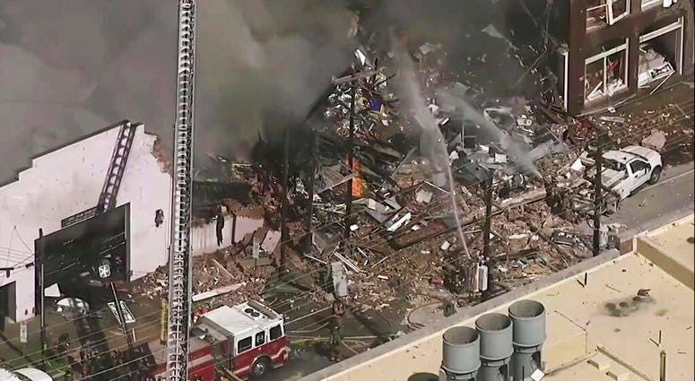 In this image taken from video firefighters and emergency officials respond to an explosion and fire in downtown Durham, N.C. on Wednesday, April 10, 2019. (WTVD-TV ABC 11 via AP) In this image taken from video firefighters and emergency officials respond to an explosion and fire in downtown Durham, N.C. on Wednesday, April 10, 2019. (WTVD-TV ABC 11 via AP)