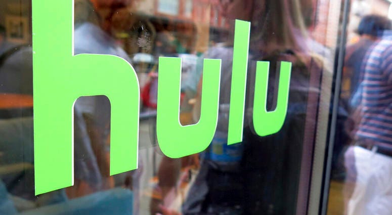 FILE - This June 27, 2015, file photo, shows the Hulu logo on a window at the Milk Studios space in New York. (AP Photo/Dan Goodman, File) FILE - This June 27, 2015, file photo, shows the Hulu logo on a window at the Milk Studios space in New York. (AP Photo/Dan Goodman, File)