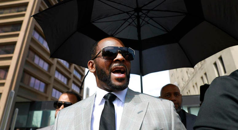 In this June 6, 2019 file photo, musician R. Kelly departs the Leighton Criminal Court building after pleading not guilty to 11 additional sex-related charges in Chicago. (AP Photo/Amr Alfiky, File)