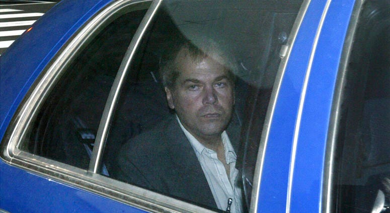 FILE - In this Nov. 18, 2003 file photo, John Hinckley Jr. arrives at U.S. District Court in Washington. The man who tried to assassinate President Ronald Reagan is interested in getting a job in the music industry, possibly in California.