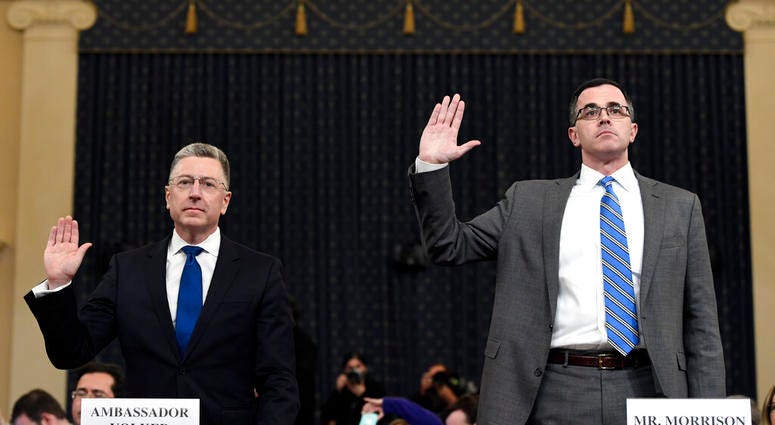 Ambassador Kurt Volker, left, former special envoy to Ukraine, and Tim Morrison, a former official at the National Security Council are sworn in to testify. (AP Photo/Susan Walsh)