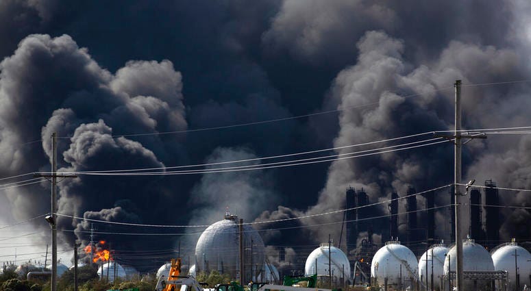 Smoke from an explosion at the TPC Group plant is seen Wednesday, Nov. 27, 2019, in Port Neches, Texas. Two massive explosions 13 hours apart tore through the chemical plant Wednesday, and one left several workers injured.