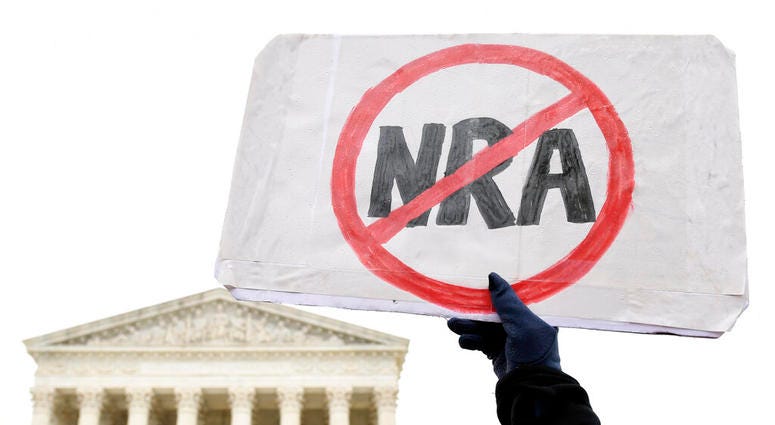 Protesters gather outside the Supreme Court in Washington, Monday, Dec. 2, 2019, during arguments in the first gun rights case before the Supreme Court in nine years. (AP Photo/Susan Walsh) Protesters gather outside the Supreme Court in Washington, Monday, Dec. 2, 2019, during arguments in the first gun rights case before the Supreme Court in nine years.
