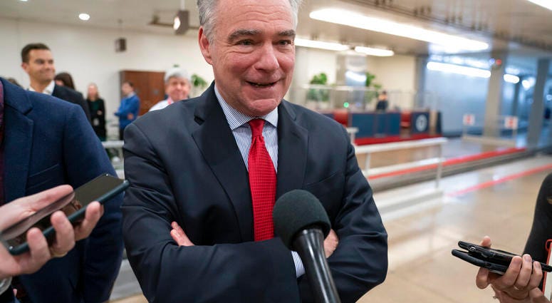 Sen. Tim Kaine, D-Va., a member of the Senate Armed Services Committee and the Foreign Relations Committee, responds to reporters. (AP Photo/J. Scott Applewhite) Sen. Tim Kaine, D-Va., a member of the Senate Armed Services Committee and the Foreign Relations Committee, responds to reporters. (AP Photo/J. Scott Applewhite)