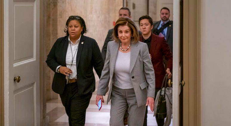 Speaker of the House Nancy Pelosi, D-Calif., arrives at the Capitol in Washington, Friday, Jan. 10, 2020.