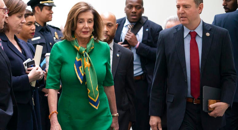 Speaker of the House Nancy Pelosi, D-Calif., joined by House Intelligence Committee Chairman Adam Schiff, D-Calif., leaves a closed-door meeting with the Democratic Caucus at the Capitol, Tuesday, Jan. 14, 2020. (AP Photo/J. Scott Applewhite) Speaker of the House Nancy Pelosi, D-Calif., joined by House Intelligence Committee Chairman Adam Schiff, D-Calif., leaves a closed-door meeting with the Democratic Caucus at the Capitol, Tuesday, Jan. 14, 2020. (AP Photo/J. Scott Applewhite)