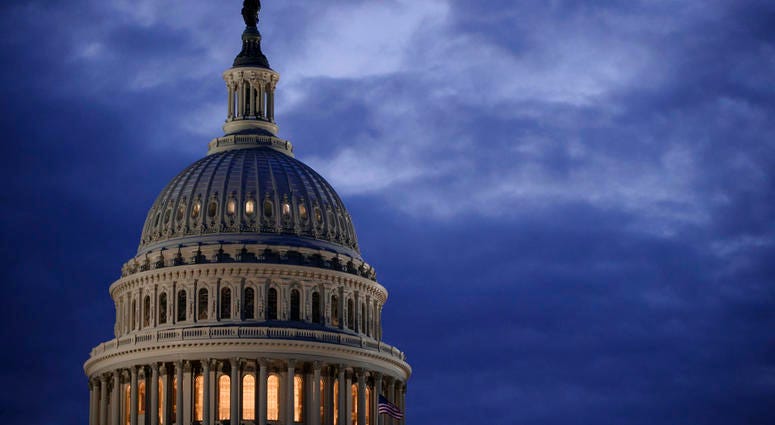 FILE - In this March 30, 2017, file photo, the Capitol Dome is seen at dawn in Washington. The Senate has kicked off its annual attempt to pass government funding bills. Success is hardly assured, but President Donald Trump has warned Congress that he wil