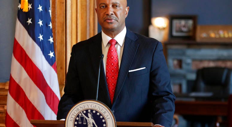 Indiana Attorney General Curtis Hill speaks during a news conference at the Statehouse in Indianapolis, Monday, July 9, 2018. Hill is rejecting calls to resign, saying his name "has been dragged through the gutter" amid allegations that he inappropriately