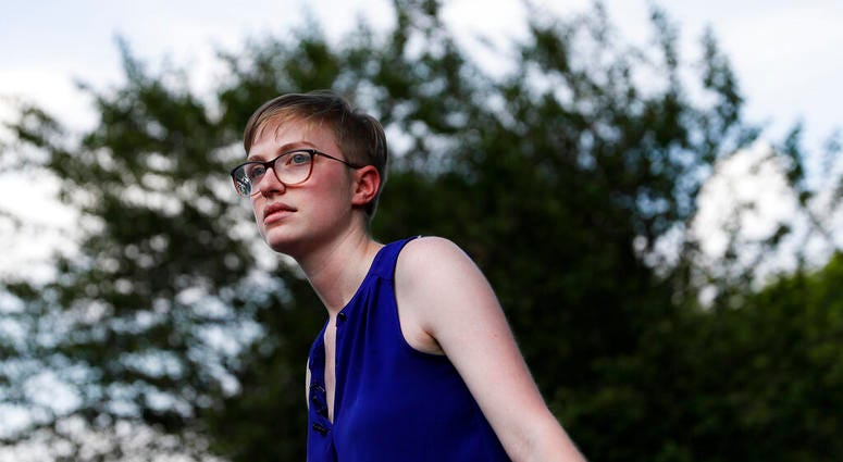 Adelia Johnson, who briefly dated Connor Betts, who fatally gunned down people on Sunday in Dayton, Ohio, speaks to members of the media in Belmont Park in Dayton on Tuesday, Aug. 6, 2019. (AP Photo/John Minchillo)