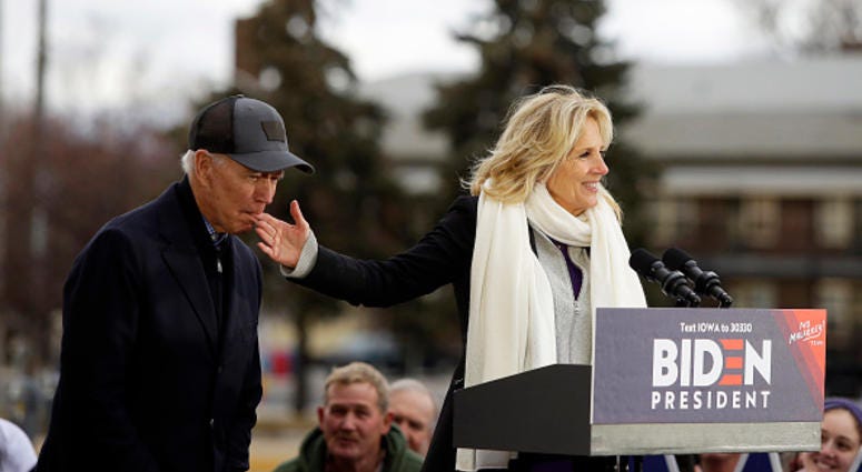 Joe Biden bites wife's hand