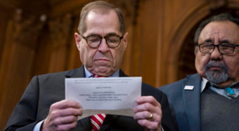 House Judiciary Committee Chairman Jerrold Nadler, D, joined by Raul Grijalva, D, looks over notes as he joins House Democrats before passing the Voting Rights Advancement Act. (AP Photo/J. Scott Applewhite) House Judiciary Committee Chairman Jerrold Nadler, D, joined by Raul Grijalva, D, looks over notes as he joins House Democrats before passing the Voting Rights Advancement Act. (AP Photo/J. Scott Applewhite)