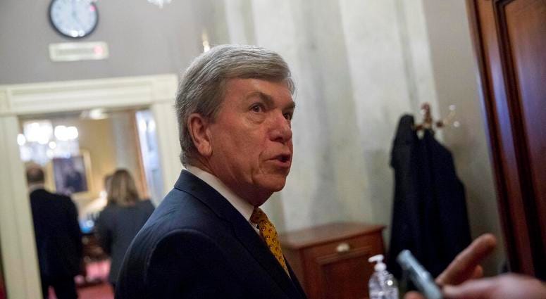 Rep. Roy Blunt, R-Mo., speaks to reporters as he walks into a meeting with Republican Senate leadership at the offices of Senate Majority Leader Mitch McConnell of Ky. on Capitol Hill, Monday, Feb. 11, 2019, in Washington. (AP Photo/Andrew Harnik)