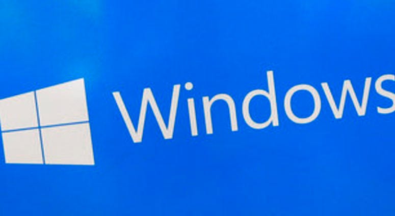 FILE - This Aug. 7, 2017, file shows a Microsoft Widows sign on display at a store in Hialeah, Fla. (AP Photo/Alan Diaz) FILE - This Aug. 7, 2017, file shows a Microsoft Widows sign on display at a store in Hialeah, Fla. (AP Photo/Alan Diaz)