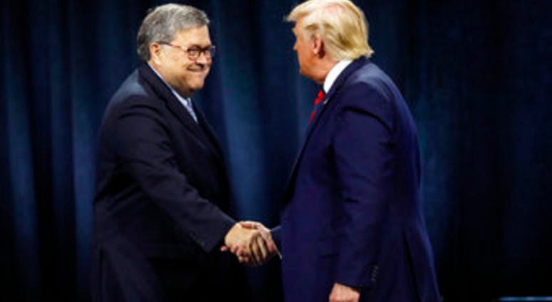 President Donald Trump shakes hands with Attorney General William Barr before Trump signed an executive order creating a commission to study law enforcement and justice. (AP Photo/Charles Rex Arbogast)