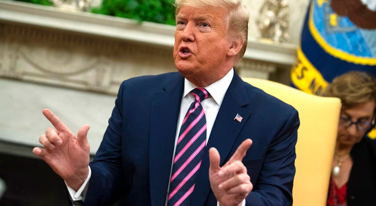 President Donald Trump speaks during a meeting with Paraguay's President Mario Abdo Benitez in the Oval Office of the White House, Friday, Dec. 13, 2019, in Washington. (AP Photo/ Evan Vucci) President Donald Trump speaks during a meeting with Paraguay's President Mario Abdo Benitez in the Oval Office of the White House, Friday, Dec. 13, 2019, in Washington. (AP Photo/ Evan Vucci)