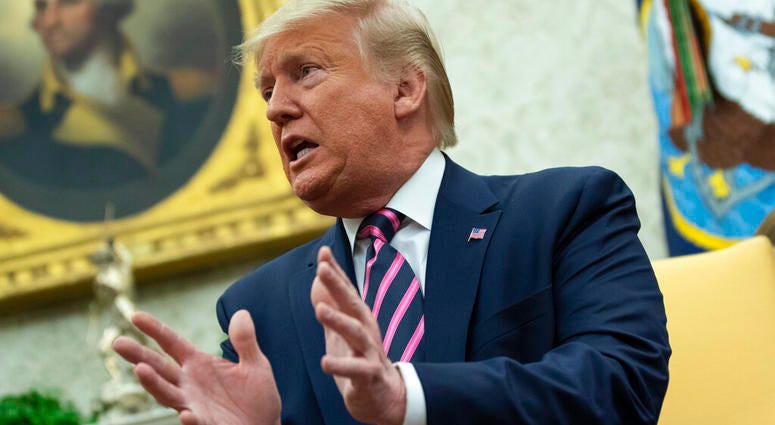 President Donald Trump speaks during a meeting with Paraguay's President Mario Abdo Benitez in the Oval Office of the White House, Friday, Dec. 13, 2019, in Washington. (AP Photo/ Evan Vucci) President Donald Trump speaks during a meeting with Paraguay's President Mario Abdo Benitez in the Oval Office of the White House, Friday, Dec. 13, 2019, in Washington. (AP Photo/ Evan Vucci)