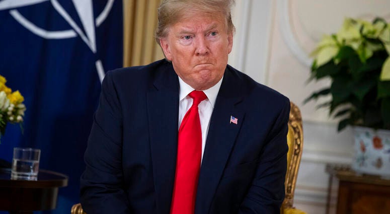 U.S. President Donald Trump speaks during a meeting with NATO Secretary General, Jens Stoltenberg at Winfield House in London, Tuesday, Dec. 3, 2019. (AP Photo/Evan Vucci) U.S. President Donald Trump speaks during a meeting with NATO Secretary General, Jens Stoltenberg at Winfield House in London, Tuesday, Dec. 3, 2019. (AP Photo/Evan Vucci)