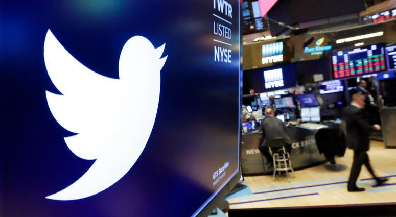 FILE - In this Feb. 8, 2018 file photo, the logo for Twitter is displayed above a trading post on the floor of the New York Stock Exchange. (AP Photo/Richard Drew, File)