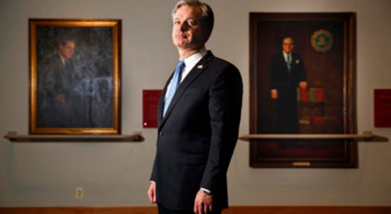FBI Director Christopher Wray poses for a photo after an interview with The Associated Press, Monday, Dec. 9, 2019, in Washington. (AP Photo/Jacquelyn Martin) FBI Director Christopher Wray poses for a photo after an interview with The Associated Press, Monday, Dec. 9, 2019, in Washington. (AP Photo/Jacquelyn Martin)