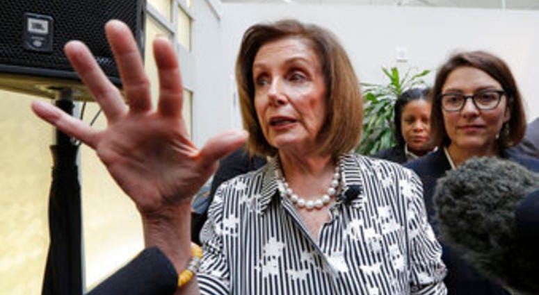 Speaker of the House Nancy Pelosi, D-Calif., left, speaks with media members with Rep. Suzan DelBene, D-Wash., after they spoke about lowering the cost of prescription drug prices. (AP Photo/Elaine Thompson)