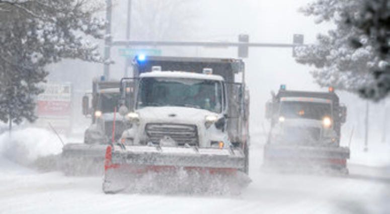 City of Denver snowplows clear the eastbound lanes of Speer Blvd. as a storm packing snow and high winds sweeps in over the region Tuesday, Nov. 26, 2019. (AP Photo/David Zalubowski) City of Denver snowplows clear the eastbound lanes of Speer Blvd. as a storm packing snow and high winds sweeps in over the region Tuesday, Nov. 26, 2019. (AP Photo/David Zalubowski)
