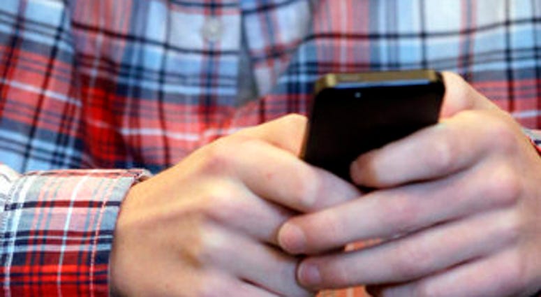 A mysterious wave of texts swept America’s phones overnight Wednesday, Nov. 6, 2019, delivering unintelligible messages that left many people mildly confused when they woke up on Thursday. (AP Photo/Nam Y. Huh, File)