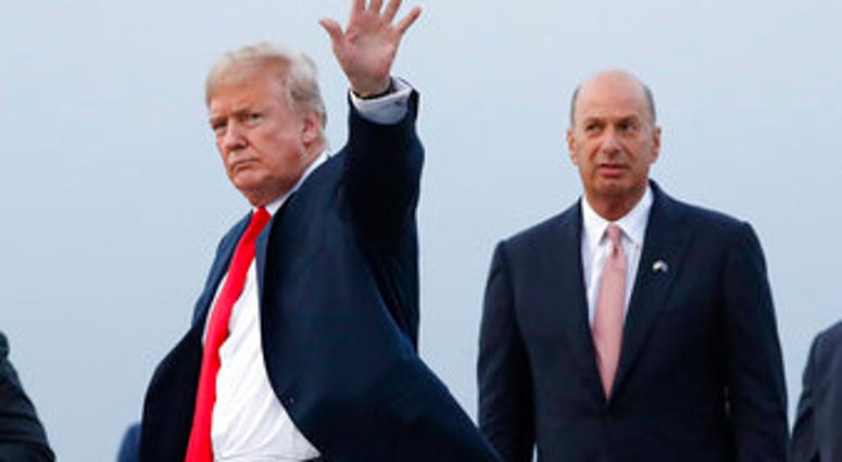 In this July 10, 2018, file photo, President Donald Trump is joined by Gordon Sondland, the U.S. ambassador to the European Union, second from right, as he arrives at Melsbroek Air Base, in Brussels, Belgium. (AP Photo/Pablo Martinez Monsivais, File)
