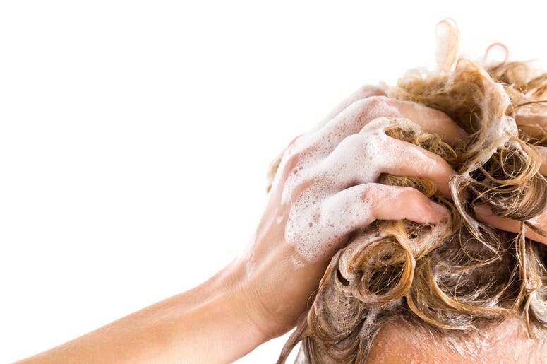 shampoo on hair in shower
